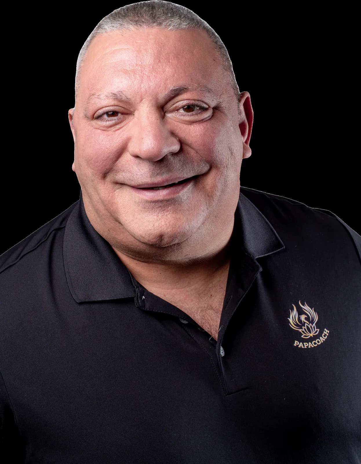 Alain Papacotsia en polo noir PAPACOACH, souriant